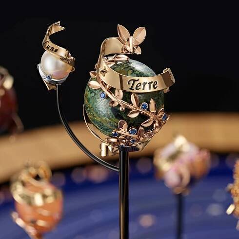 The Earth in rose and yellow gold, blue sapphires and jasper, Van Cleef & Arpels.