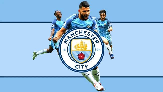 Enjoying success together: Manchester City players celebrating their victory Wallpaper