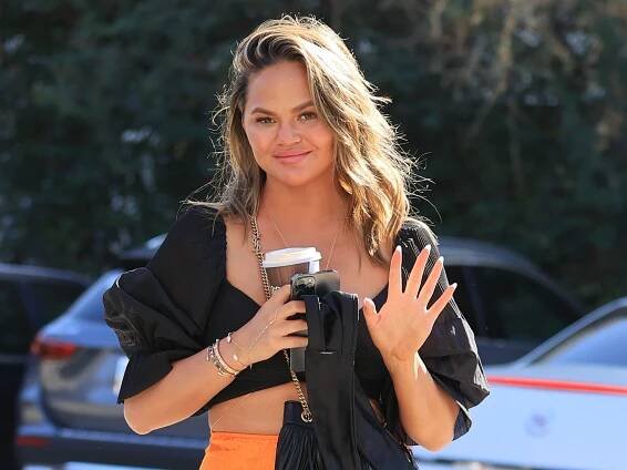Chrissy Teigen Got Tiny Dot Tattoos All Over Her Fingers