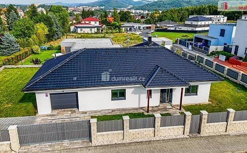 Luxusní novostavba prostorného rodinného domu s garáží, terasou a zahradou v Karlových Varech