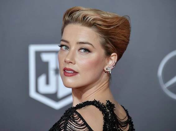 Amber Heard enters her 'theater era' as she returns to the US