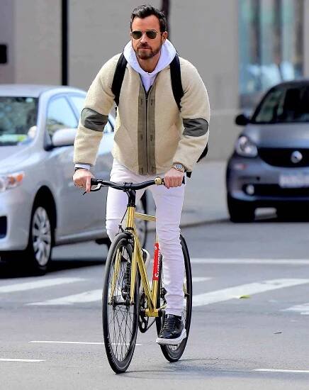 Justin Theroux Takes a Bike Ride with a Gold Bike and a Gold Rolex