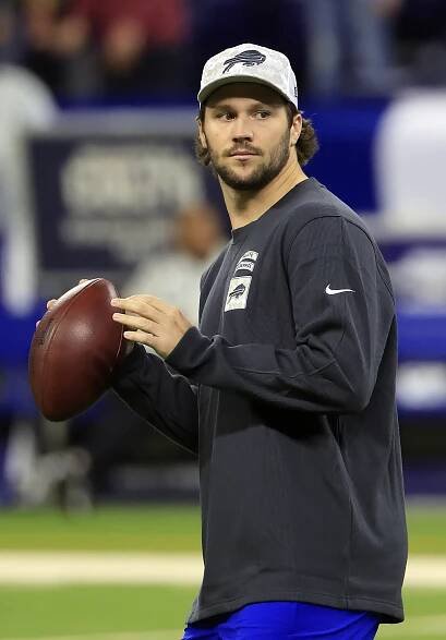 Josh Allen holding a football