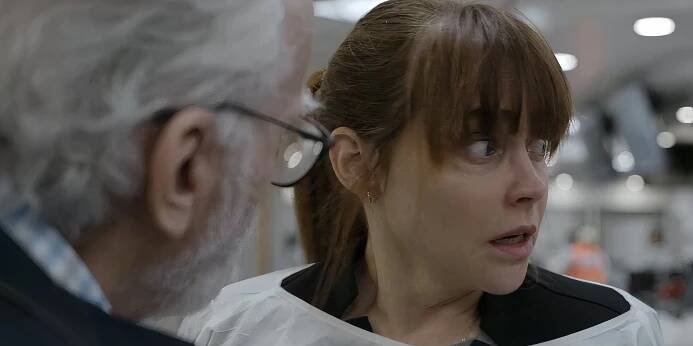 Neil McKay (Brad Dourif) looks at his daugher Dr. McKay (Fiona Dourif) in The Pitt
