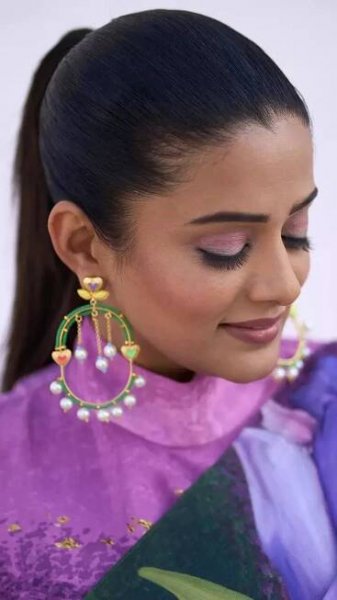 Priyamani shows how to style a saree with a burst of colors