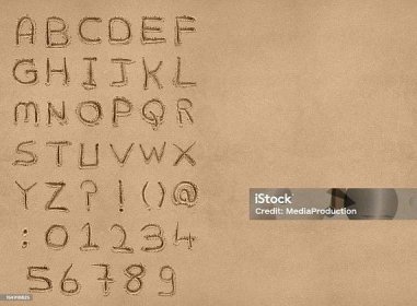 Písečná abeceda s ořezovou cestou - Bez autorských poplatků Písek Stock fotka