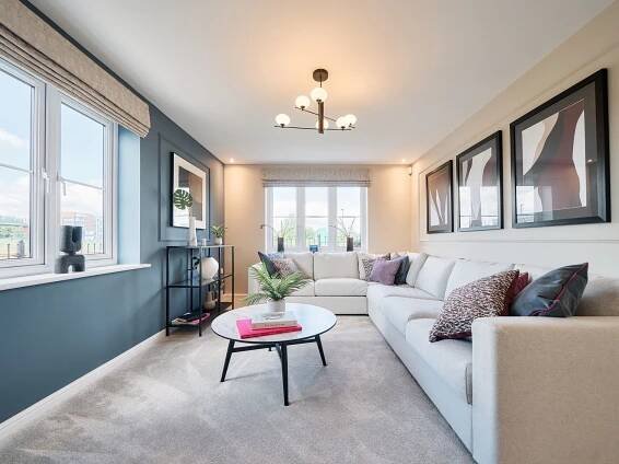 Bright living room with large white sofa