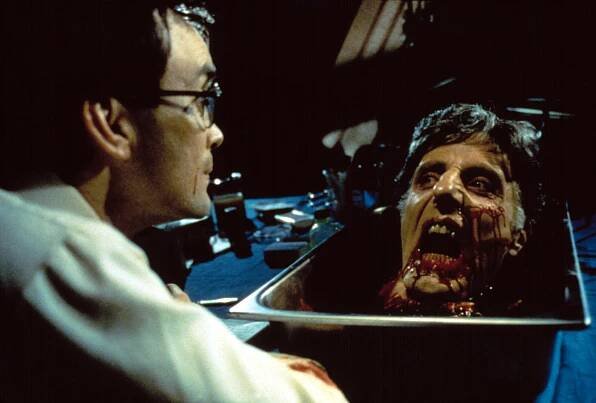 Jeffrey Combs and David Gale in 'Re-Animator'