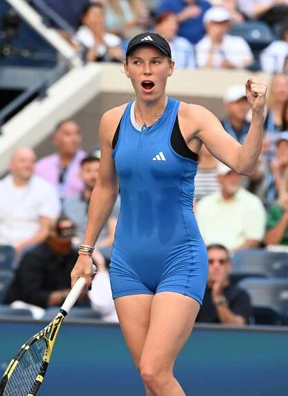 Caroline Wozniacki pumps her fist after a good shot during the US Open
