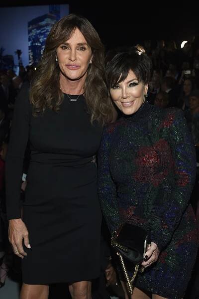 Caitlyn and Kris Jenner smiling.