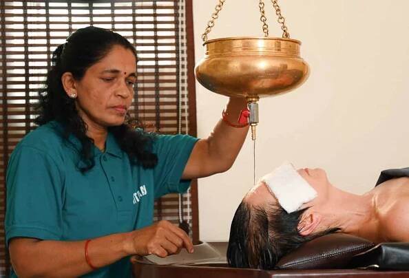 Shirodhara treatment at Hitayu Ayurveda retreat India