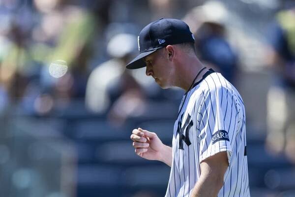 Allan Winans of the New York Yankees reacts on the mound in the ninth inning against the Athletics at Yankee Stadium, Saturday, June 28, 2025, in Bronx, NY. 