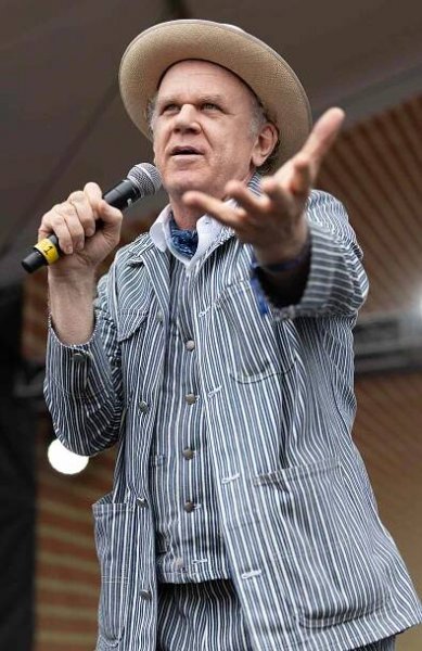 John C. Reilly serves as master of ceremonies during the closing set, "Songs for the People", at the 2025 Newport Folk Festiva