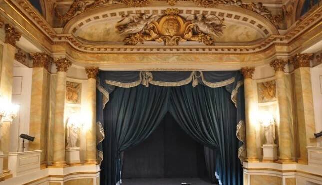 A theatre stage. Credit: Canva