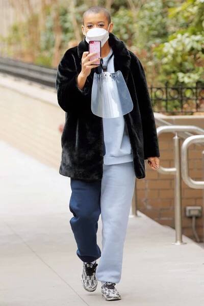 Jordan Alexander wears two-tone sweat pants on the set of 'Gossip Girl' in New York City