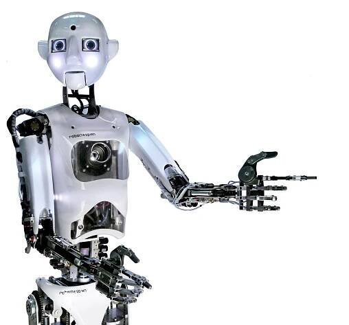An expressive humanoid robot with a bright round face, a shiny torso with sensors, and two arms with black jointed fingers.