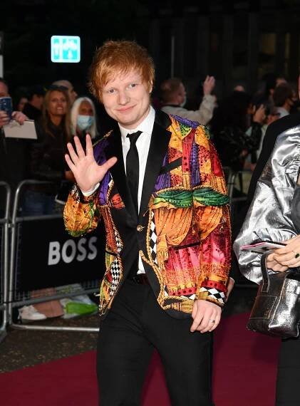 Bad Habits singer Ed Sheeran gets some fashion advice from close pal Elton John before attending last night’s GQ Men of the Year Awards
