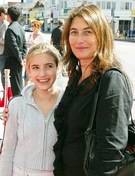 Actress Emma Roberts, niece of actress Julia Roberts, and her mother Kelly Cunningham arrive at the world premiere of "Grand Champion" at the Crest Theatre on August 22, 2004 in Los Angeles, California. 