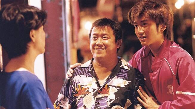 Eric Tsang (centre) and Nicholas Tse in a still from Riley Ip’s 1999 film Metade Fumaca, one of five he made around the turn of the century.