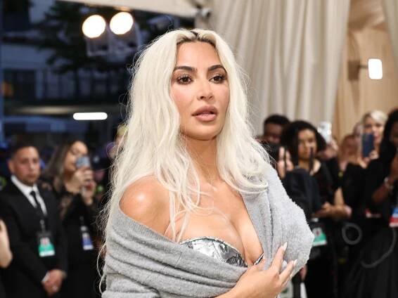 Blonde Kim Kardashian Arrives at the Met Gala 2024 in See-Through Metal Skirt — See Photos
