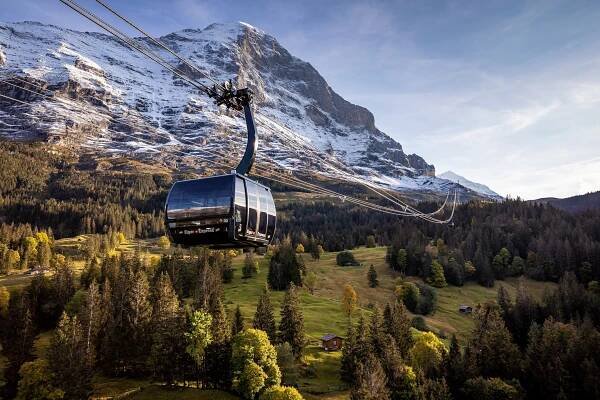 the gondola from the Eiger Express tricable in front of the north face of the Eiger