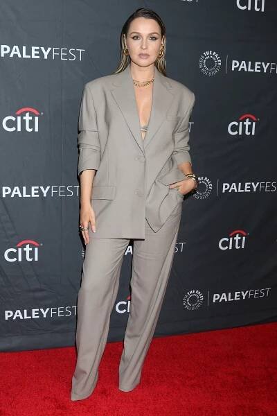 Standing at the height of 5 feet 5 ⅛ inches (165.4 cm), Camilla Luddington wore O'Connor pants with a Stone blazer by Aknvas to promote the 19th season of Grey’s Anatomy