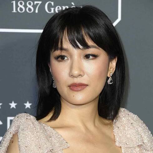 constance wu poses with black hair with bangs