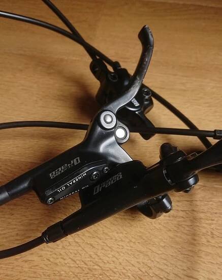 Přední a zadní hydraulické brzdy Tektro Draco z trekového kola - Cyklistika