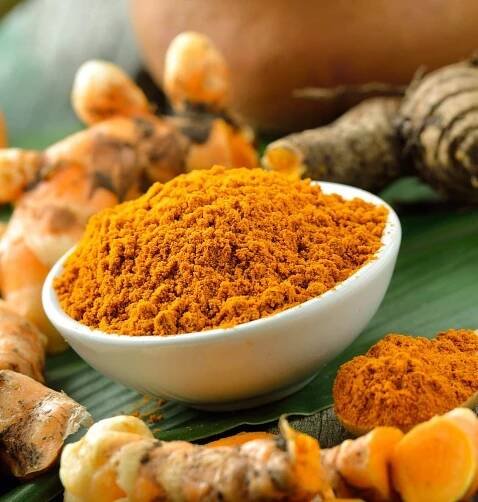 a small bowl with curcumin, how to boost your immune system