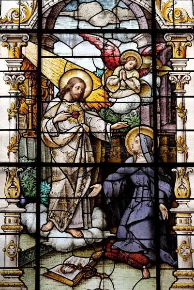 Jesus and Saint Margaret Mary Alacoque, stained glass window in the Basilica of the Sacred Heart of Jesus in Zagreb, Croatia. Margaret saint stock images, royalty-free photos and pictures