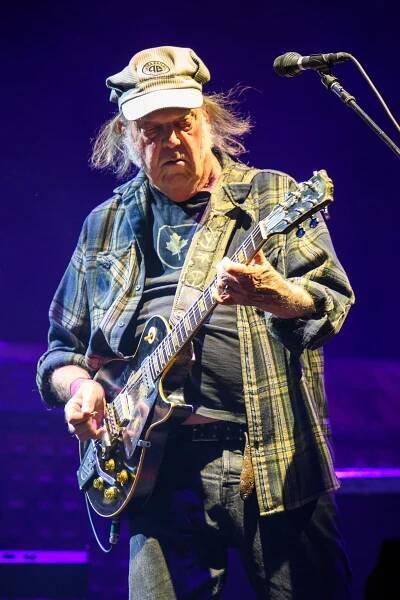 Neil Young performing at Glastonbury Festival.