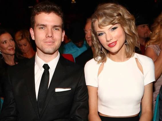 Austin Swift (L) and recording artist Taylor Swift attend the 49th Annual Academy of Country Music Awards