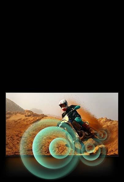 A man riding a motorbike on a dirt track with bright circle graphics around the motorbike.