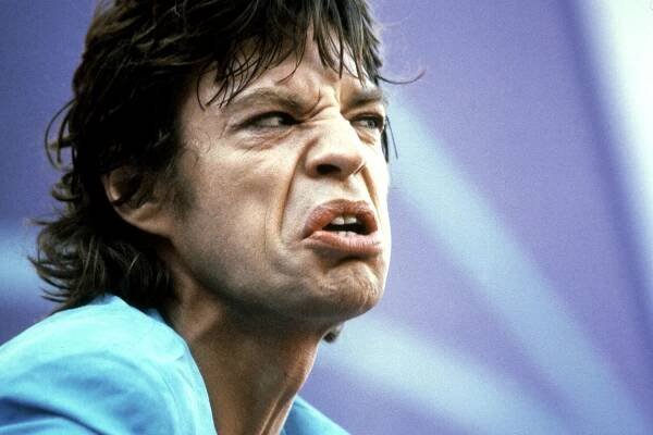GOTHENBURG, SWEDEN - JUNE 19:  Mick Jagger, lead singer for the rock group the "Rolling Stones" performs with his band in the Ullevi Stadium in Gothenburg, Sweden, 19 June 1982, before some 112 177 spectators.   (FILM) AFP PHOTO  (Photo credit should read TOMMY WIBERG/AFP via Getty Images)