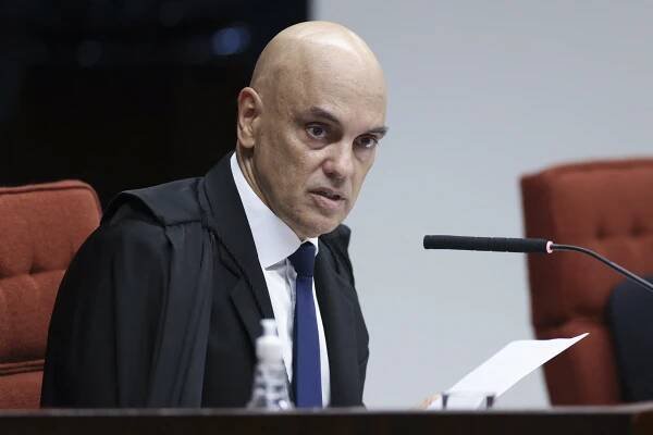 Handout picture released by Brazilian Supreme Court shows Brazilian Supreme Court Justice Alexandre de Moraes during a session of the Supreme Court as it decides if former President Jair Bolsonaro will face trial in Brasilia on March 26, 2025. Brazil's Supreme Court on March 26, 2025, ordered far-right ex-president Jair Bolsonaro to stand trial on charges of plotting a coup after failing to win re-election in 2022. (Photo by Antonio AUGUSTO / Brazilian Supreme Court / AFP) / RESTRICTED TO EDITORIAL USE - MANDATORY CREDIT 
