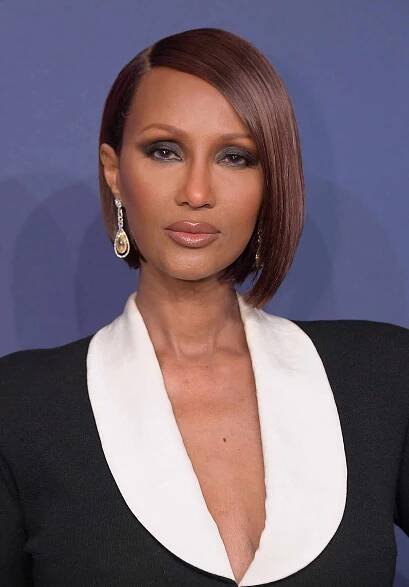 Iman with sleek side part bob 