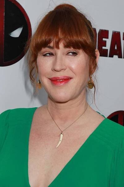 Molly Ringwald Glowing in the Spotlight Wallpaper