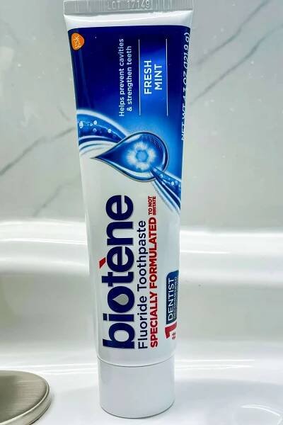 A tube of Biotène Gentle Formula Fluoride Toothpaste