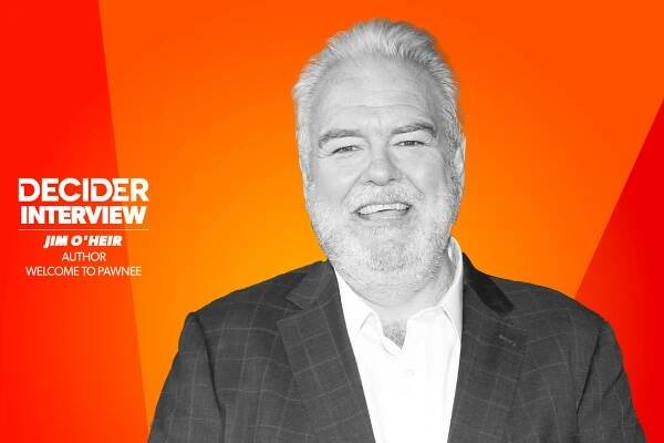 Jim O'Heir in black and white on a bright orange background