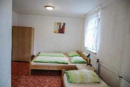 Postel nebo postele na pokoji v ubytování Chata Bajama