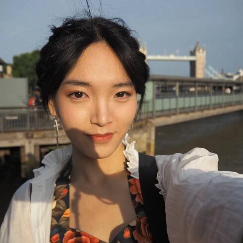 Zhang with Tower Bridge in the background