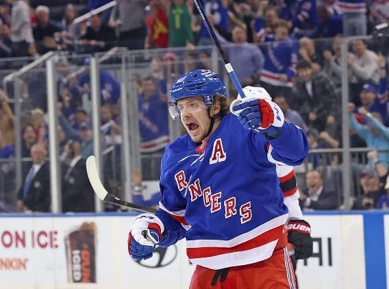 Artemi Panarin #10 of the New York Rangers celebrating a goal.