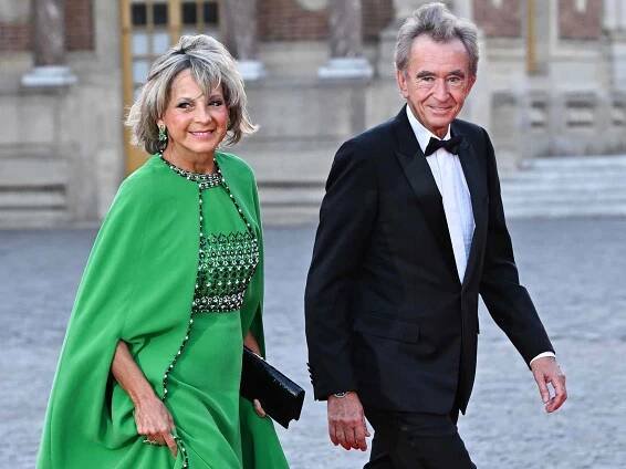 Helene Mercier and Bernard Arnault arrive at the Palace of Versailles ahead of the State Dinner held in honor of King Charles III and Queen Camilla on September 20, 2023 in Versailles, France.