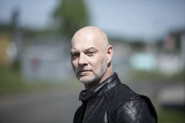 Simon Licht wearing leather bike jacket