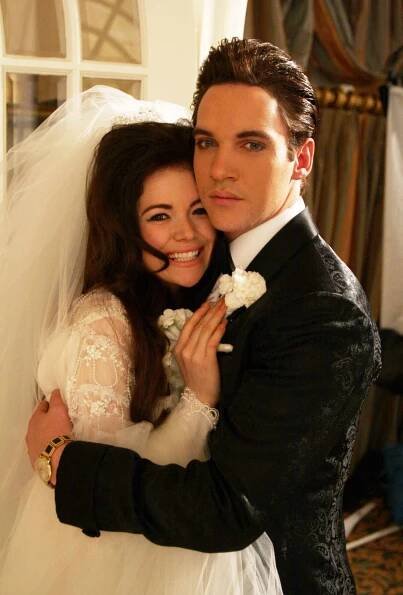 Elvis Presley (Jonathan Rhys Meyers) and Priscilla (Antonia Bernath) on their wedding day, in ELVIS, a four-hour mini-series which will be broadcast as the "CBS Sunday Movie," Sunday, May 8.