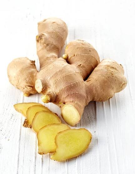 whole and sliced ginger root