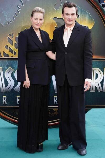 Rupert Friend and Aimee Mullins arriving at the Jurassic World Rebirth world premiere, at the Odeon Luxe, Leicester Square in London. Picture date: Tuesday June 17, 2025.