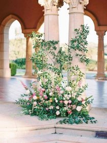 cavin david wedding floral installation in front of columns