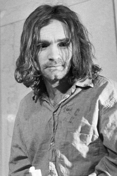 Charles Manson arrives in court to enter a plea to seven counts of murder and one count of conspiracy.