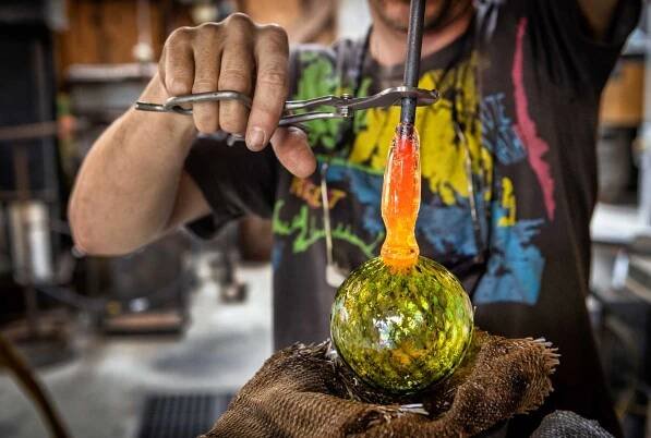 adding stem to green glass ornament, glassblower, Michael Allison, The Creative Push